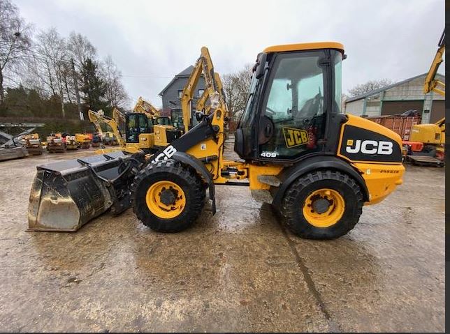 T2 Chargeuse compacte JCB 409 – 2011 – Image 1
